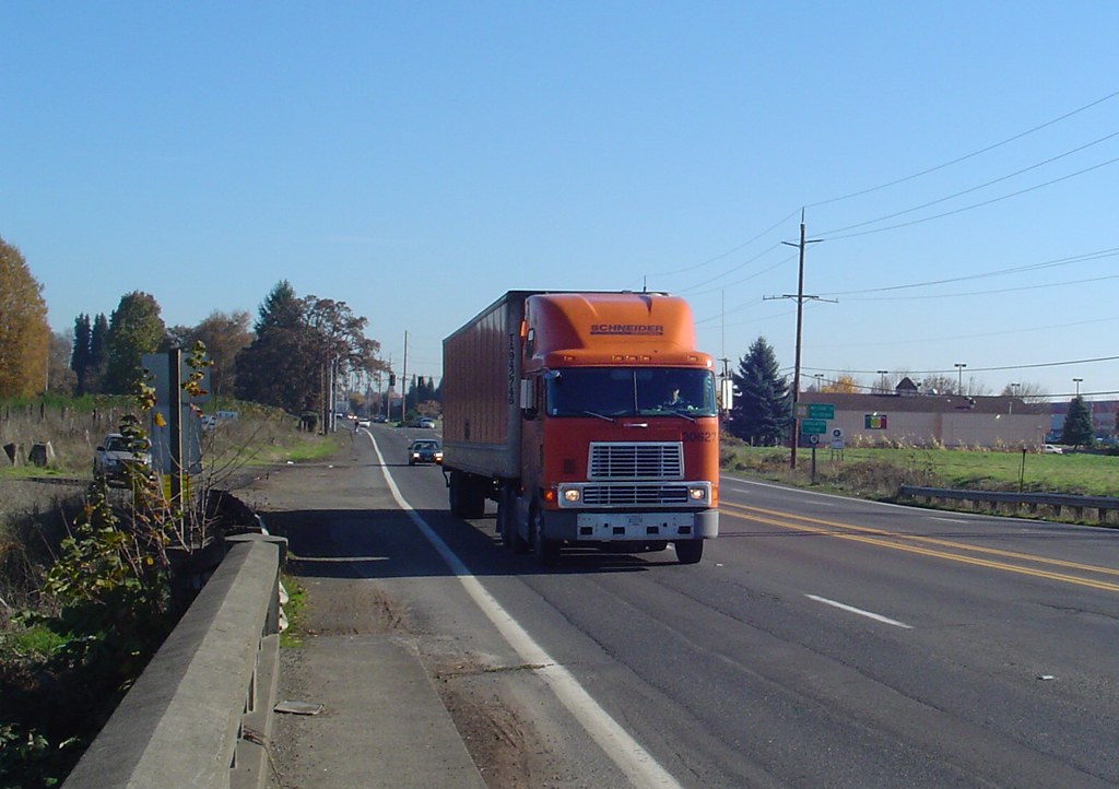 red truck on road during daytime
